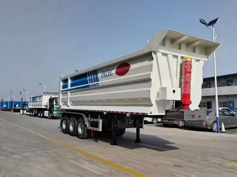 Dump semi-trailer, side three-quarter view